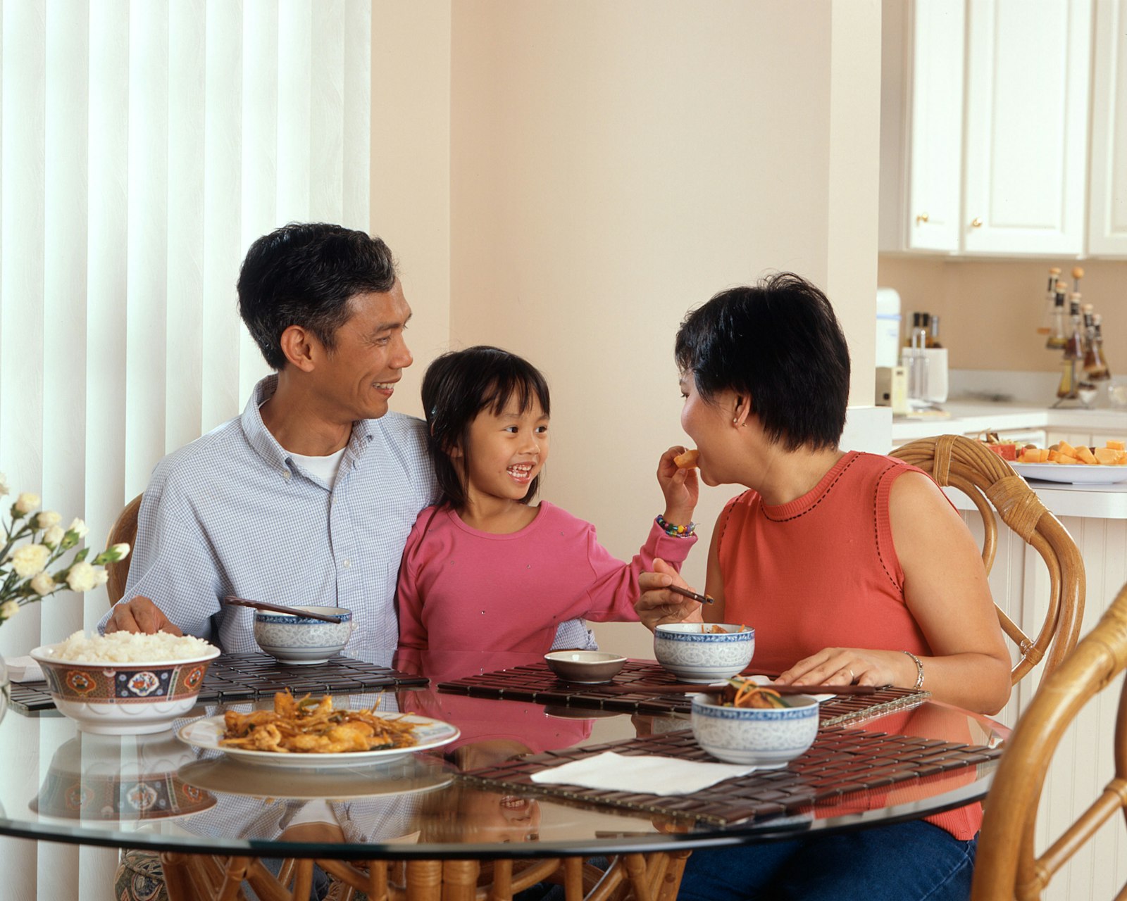Family enjoying a meal together — healthspan across generations