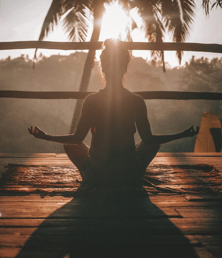 Woman meditating — mental wellbeing is Level 1 for healthspan