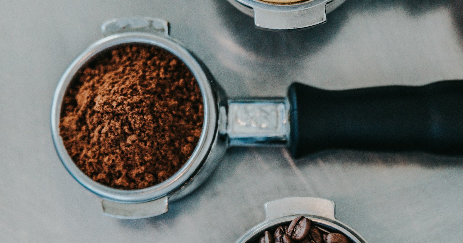 cup of coffee with coffee beans